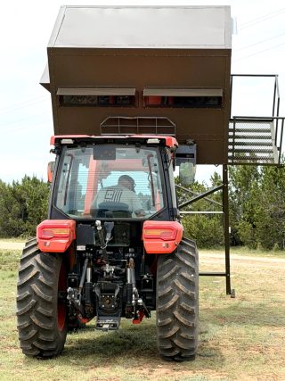 The tractor and high hunting blind at BarBell Ranch in Sweetwater, TX, ready for placement.