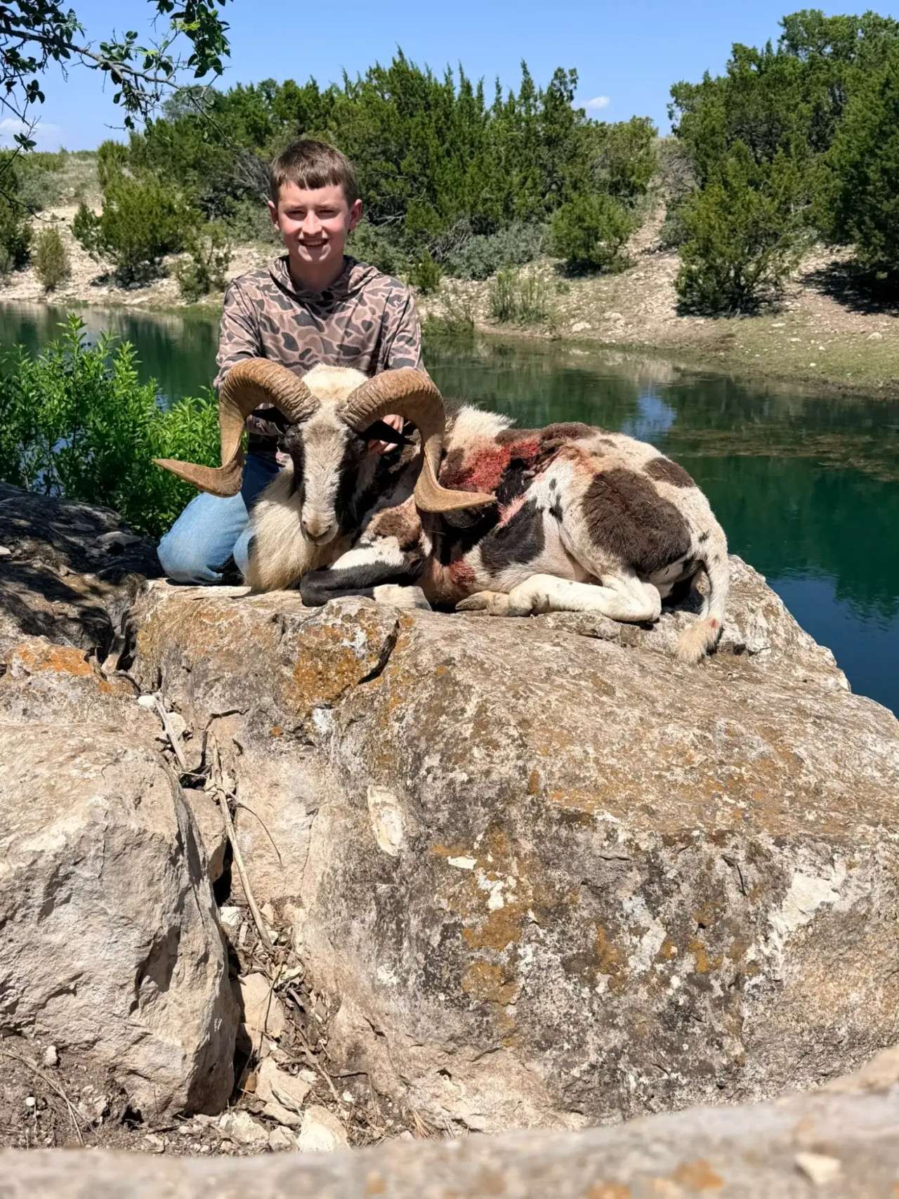 Mother, father, and son with a trophy Desert Paint Ram taken at BarBell Ranch in Sweetwater, TX.
