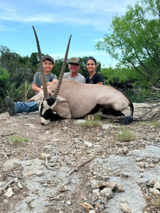 Family with a Gemsbok taken at BarBell Ranch in Sweetwater, TX.