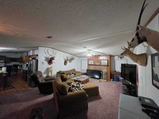 The spacious common area of the lodge provides a comfortable space for hunters at BarBell Ranch.