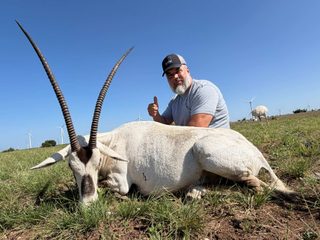 Hunter with a large Arabian Oryx taken at BarBell Ranch in Sweetwater, TX.