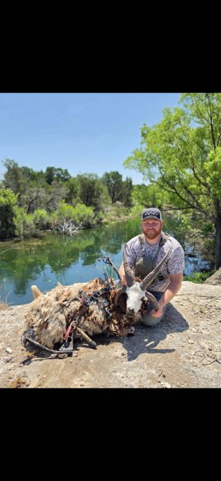 Hunter with a Jacob's Four-Horn Ram taken at BarBell Ranch in Sweetwater, TX.