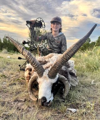 A young hunter and his Jacob's Four-Horn Ram taken at BarBell Ranch in Sweetwater, TX.