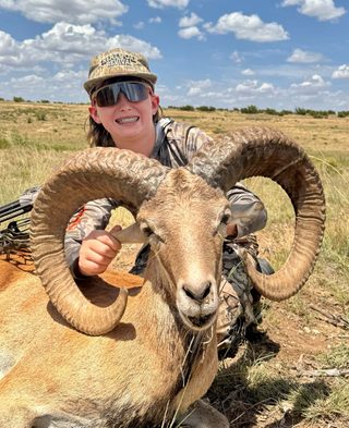 A hunter with his trophy TCU ram taken at BarBell Ranch in Sweetwater, TX.