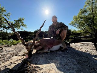 A hunter with his magnificent Blackbuck taken at BarBell Ranch in Sweetwater, TX.