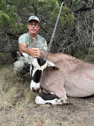 Hunter and his harvested broken horn Gemsbok from BarBell Ranch in Sweetwater, Texas.